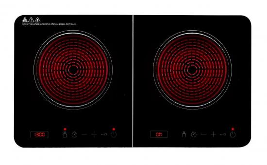 Rot leuchtende zweifach Kochplatte mit digitaler Anzeige und Bedienelementen
